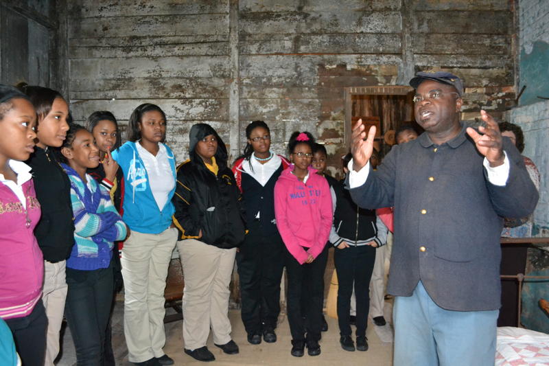 Joseph McGill with a group of students (image from The Slave Dwelling Project)